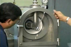 people looking at a gas/liquid solid separator